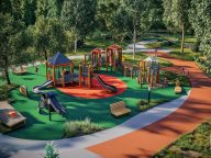 A playground designed with accessible equipment for children with disabilities, promoting inclusive play