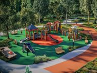 A playground designed with accessible equipment for children with disabilities, promoting inclusive play