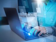 ERP, document management concept.Businessman working with laptop