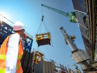 engineering, loading master connecting with gantry crane driver