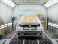 The oven cabin with a freshly painted car inside