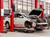 closeup car in repair station and body shop with soft-focus and