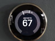Smart home thermostat from google’s nest. Green tech saving heat