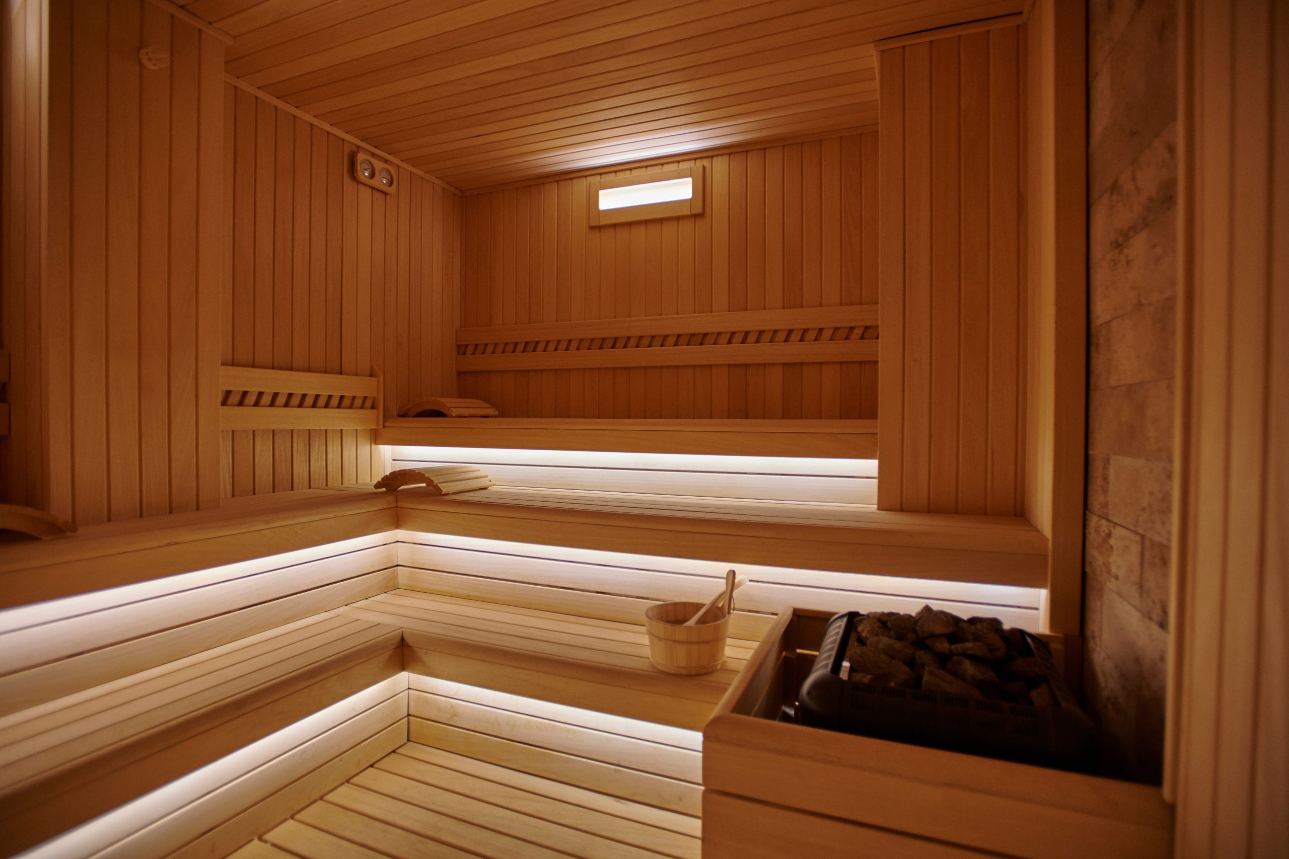 Sauna interior concept, empty wooden steam room in hotel. Health